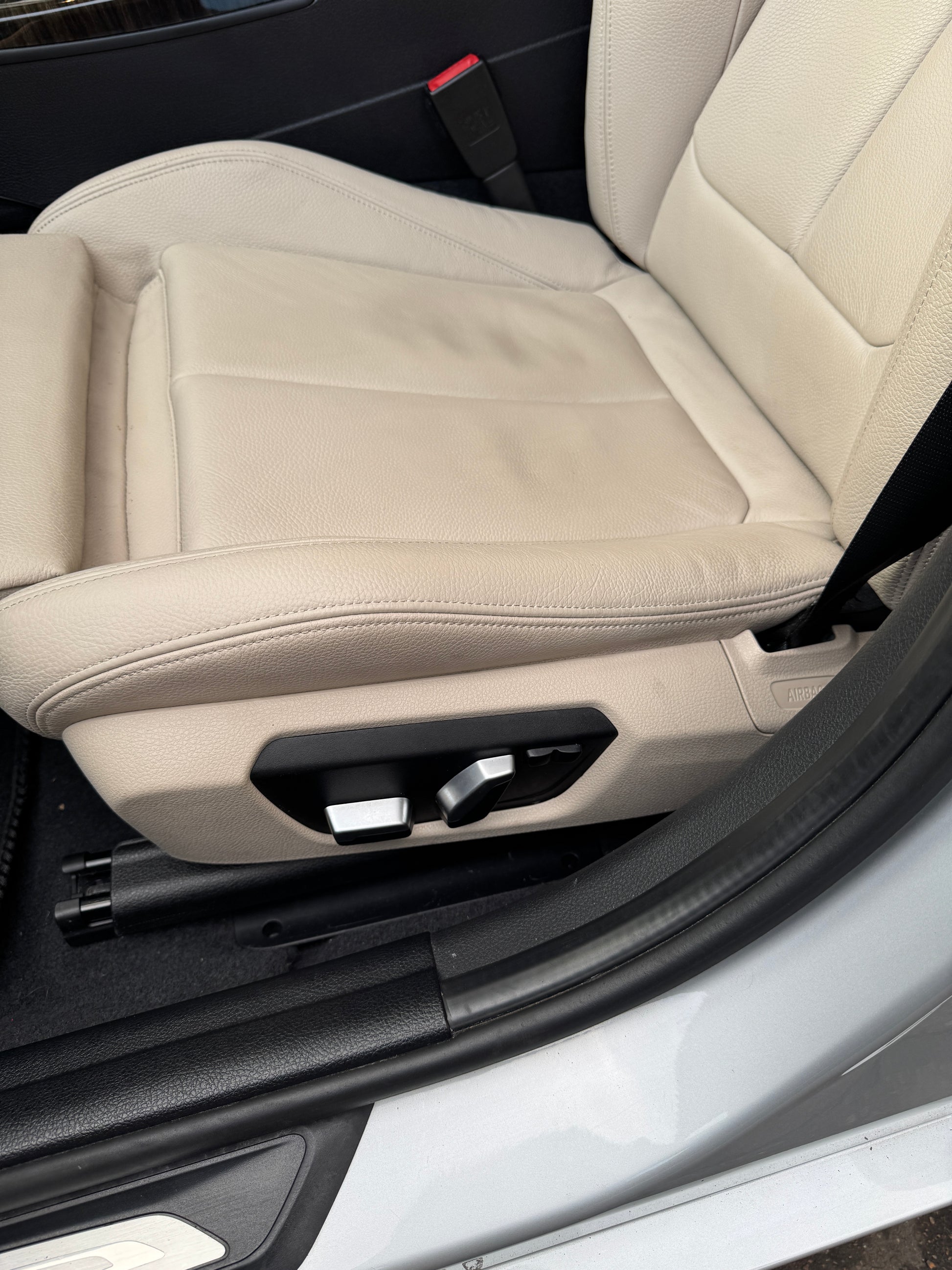 Passenger electric seat controls